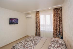 Cama o camas de una habitación en Luxe apart-hotel near Lavina New Building 1 floor
