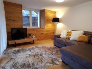 Un televizor și/sau centru de divertisment la Britannia - Apartment Patagonia
