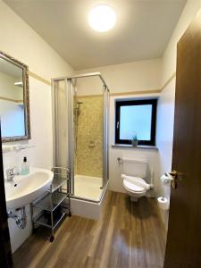 Koupelna v ubytování Hotel garni Bellevue
