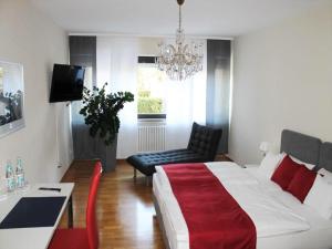 Postel nebo postele na pokoji v ubytování Hotel garni Bellevue