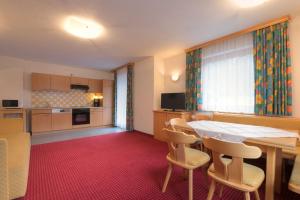 Kuchyňa alebo kuchynka v ubytovaní Appartements Barbara + 8 fotografií