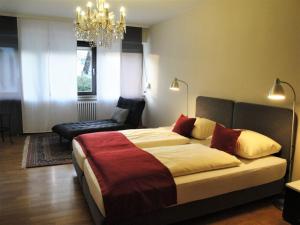 Postel nebo postele na pokoji v ubytování Hotel garni Bellevue