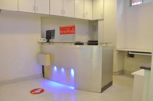 Kuchyň nebo kuchyňský kout v ubytování JK Rooms 126 Parashar Legacy - Opp Railway Station