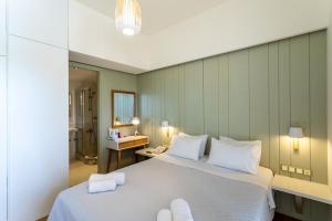 Katil atau katil-katil dalam bilik di Lefktron Hotel