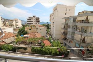 a view from a window of a city with buildings at Mona`s apartments 1 in Sarandë