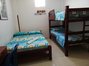 Postel nebo postele na pokoji v ubytování Hotel Real Pólux