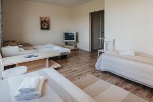 Postel nebo postele na pokoji v ubytování Staadioni Hotel