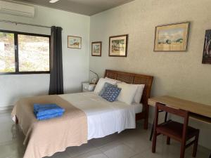 En eller flere senger på et rom på Riva-La-Vista-Cooktown