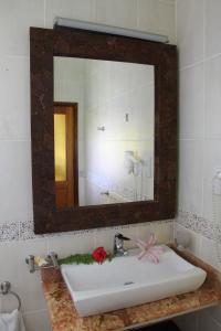 Koupelna v ubytování La Digue Self-Catering Apartments