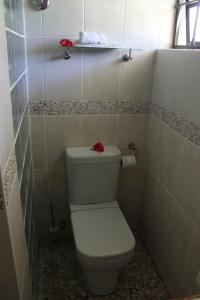 Koupelna v ubytování La Digue Self-Catering Apartments