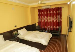 TV a/nebo společenská místnost v ubytování New sunlight Hotel