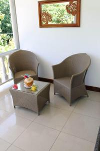Posezení v ubytování La Digue Self-Catering Apartments
