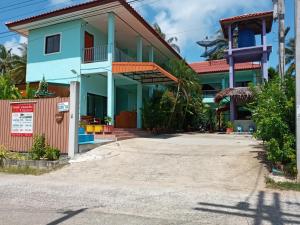 a house on the side of the road at Stella Resort Khanom in Khanom