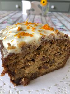 a piece of carrot cake with cream cheese frosting at The Vandees in Aghalee