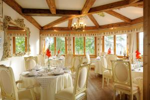 En restaurant eller et andet spisested på Naturhotel Alpenrose