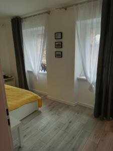 Posteľ alebo postele v izbe v ubytovaní Apartament na Zakręcie