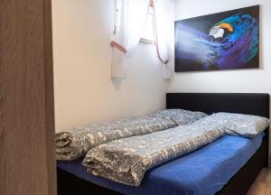 En eller flere senge i et værelse på Ferienwohnung-lenne-Finnentrop