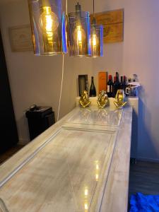 a glass counter with lights on top of it at Scheveningen Diamond View Beach and Harbour in Scheveningen