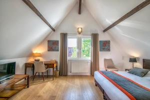 Giường trong phòng chung tại La Villa Du Coteau +23 ảnh