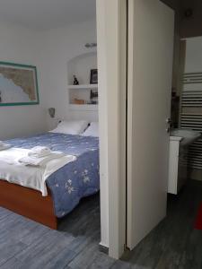 A bed or beds in a room at Fabienne