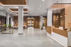 a lobby of a hotel with a reception desk at Hotel Jägerhof in Plovdiv