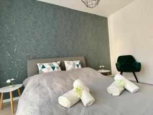 Ένα ή περισσότερα κρεβάτια σε δωμάτιο στο Apartment Malá Praha