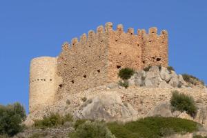 a large castle on top of a mountain at Piso Zafer Alcora in Alcora