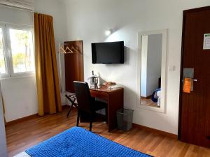 Μια τηλεόραση ή/και κέντρο ψυχαγωγίας στο Hotel Rubi