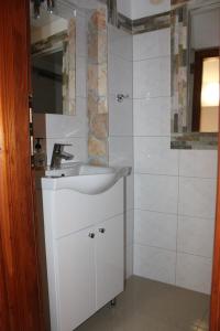 Kuchyň nebo kuchyňský kout v ubytování Pile Apartments 7