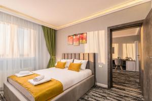 Ένα ή περισσότερα κρεβάτια σε δωμάτιο στο Stejarii Resort