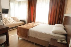 Postel nebo postele na pokoji v ubytování River Hotel + 13 fotografií