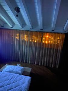 A bed or beds in a room at Molino Apartments
