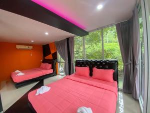 Postel nebo postele na pokoji v ubytování Natthapon Resort Kaeng Kachan