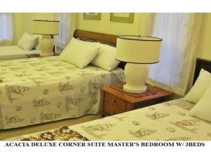 Tempat tidur dalam kamar di Agreeable Family Baguio Suites