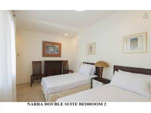 Postel nebo postele na pokoji v ubytování Agreeable Family Baguio Suites
