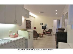 Kuchyň nebo kuchyňský kout v ubytování Agreeable Family Baguio Suites