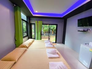 Postel nebo postele na pokoji v ubytování Natthapon Resort Kaeng Kachan