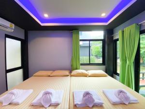 Postel nebo postele na pokoji v ubytování Natthapon Resort Kaeng Kachan