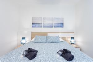 Postel nebo postele na pokoji v ubytování MEDANO Surf Beach Holiday Home by Sunkeyrents