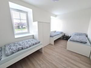 Postel nebo postele na pokoji v ubytování Ubytování Na Nové