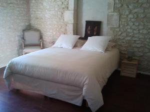Postel nebo postele na pokoji v ubytování Chambres d'Hôtes La Grange Au Bois