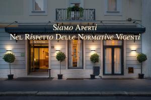 een gebouw met een bord dat Stanza Agent istg leest bij Hotel Bernina in Milaan