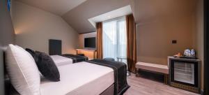 Cama ou camas em um quarto em MENALO HOTEL PREMIUM ISTANBUL AIRPORT