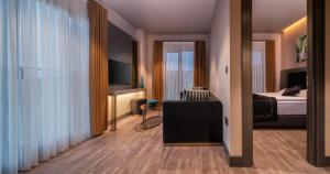 Cama ou camas em um quarto em MENALO HOTEL PREMIUM ISTANBUL AIRPORT