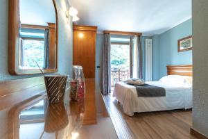 Postel nebo postele na pokoji v ubytování Hotel Du Glacier + 14 fotografií