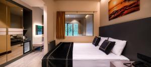 Cama ou camas em um quarto em MENALO HOTEL PREMIUM ISTANBUL AIRPORT