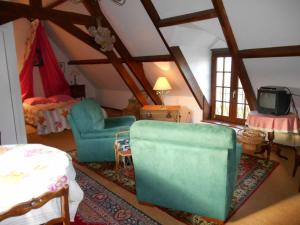 Гостиная зона в Chambres d'hôtes ''La Grand' Maison''