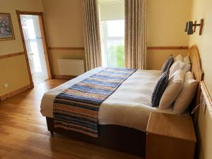 Letto o letti in una camera di O'Shea's Hotel