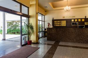 a lobby with a reception desk in a building at Viand Hotel - Premium All Inclusive in Sunny Beach
