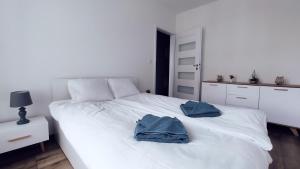 Posteľ alebo postele v izbe v ubytovaní Dąbska 26 by Homeprime